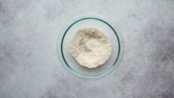 dry ingredients of almond flour in a clear glass bowl