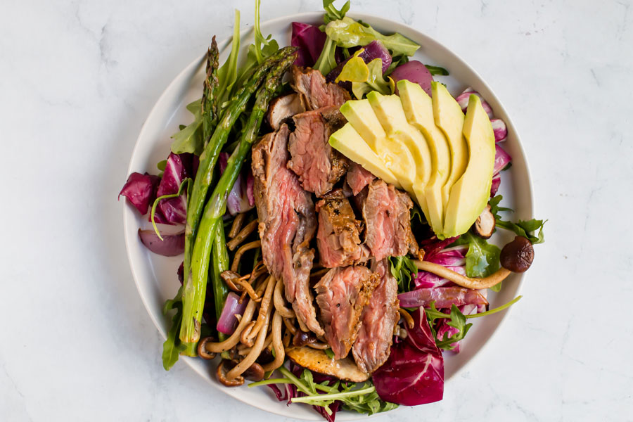 overhead shot of keto grilled steak salad