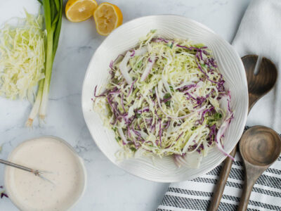 mixing up keto coleslaw