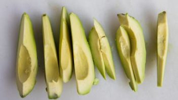 slices of avocado on a cutting board