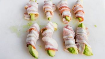 bacon wrapped around bacon slices on a tray