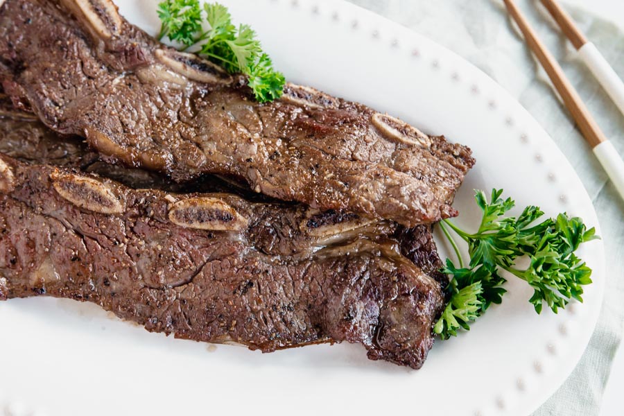 crispy short ribs next to parsley