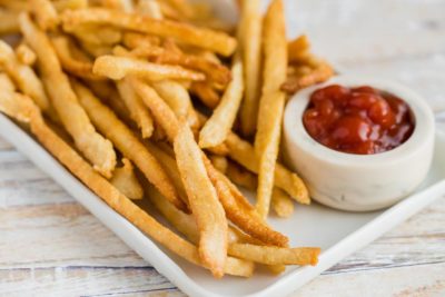 golden brown french fries on a plate