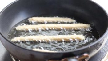 french fries frying in hot oil