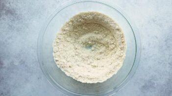 Almond flour in a glass bowl.
