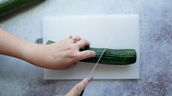 slicing a cucumber at a 45 degree angle