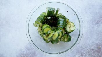 a bowl of sliced cucumbers