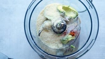 avocado and parmesan cheese in a food processor