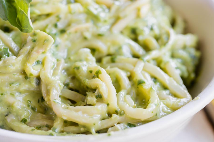 creamy pesto mixed into keto noodles