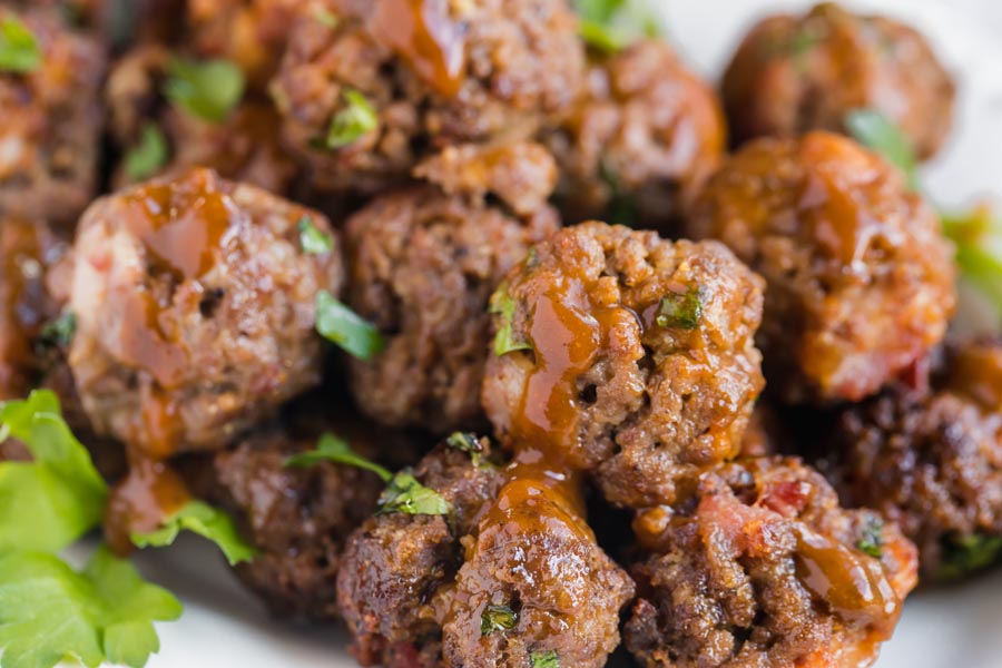 juicy keto meatballs on topped with parsley