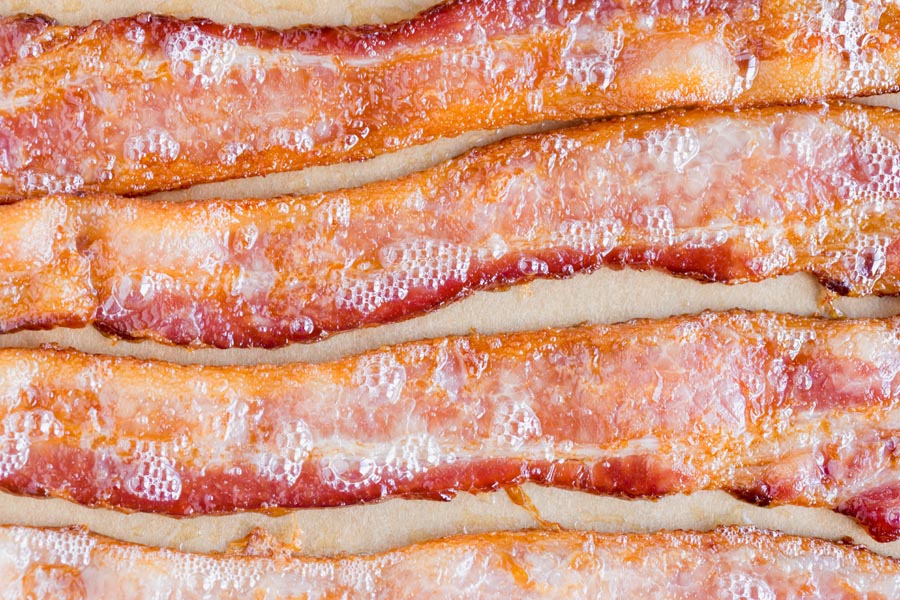 strips of cooked bacon on a tray