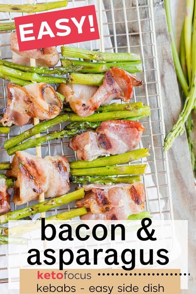 bacon weaved in between three chunks of asparagus on a skewer