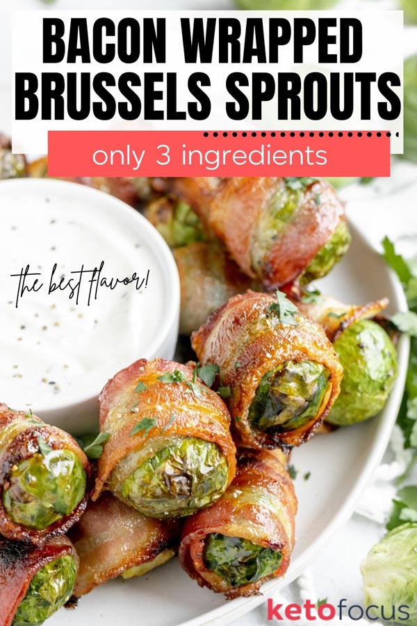a plate of cooked brussel sprouts wrapped in bacon on a plate with ranch dressing on the side