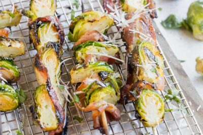 crispy brussels sprouts on a skewer with bacon