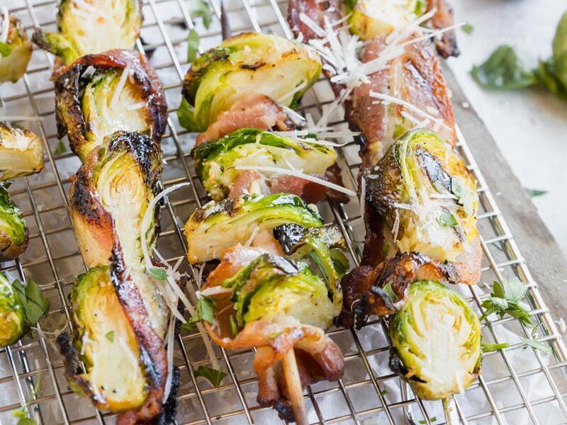 crispy brussels sprouts on a skewer with bacon