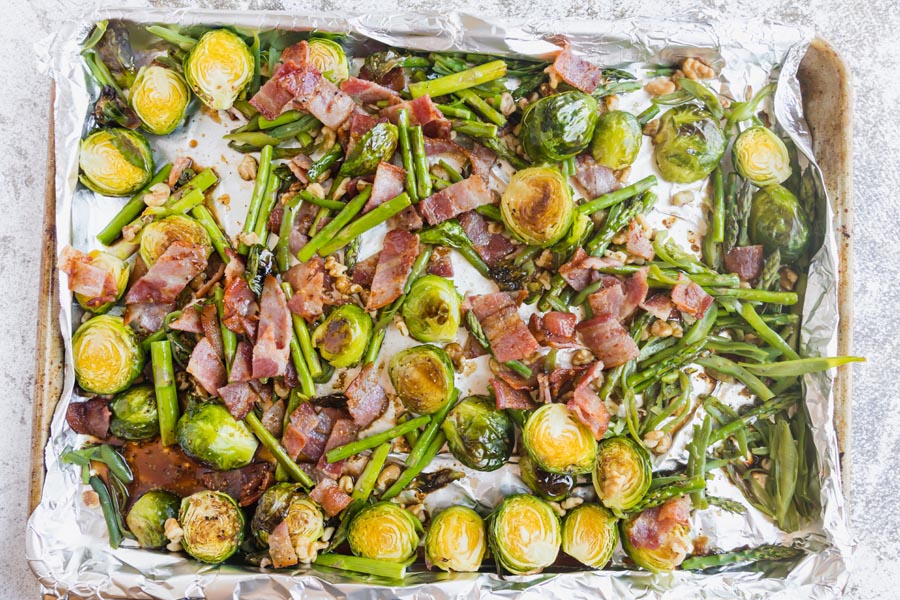 sheet pan dinner with brussels sprouts, asparagus, green beans and bacon