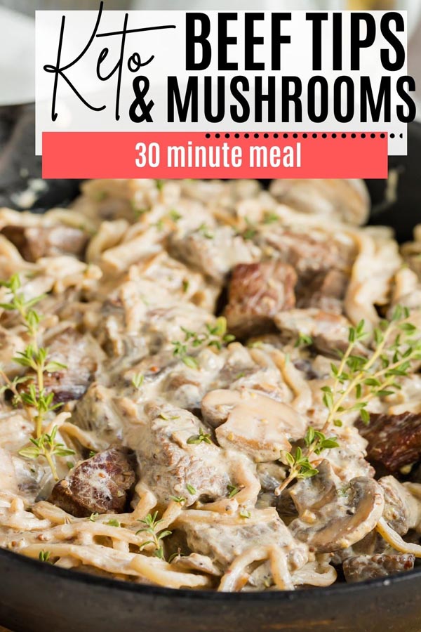 creamy beef tips with mushrooms and noodles covered with thyme