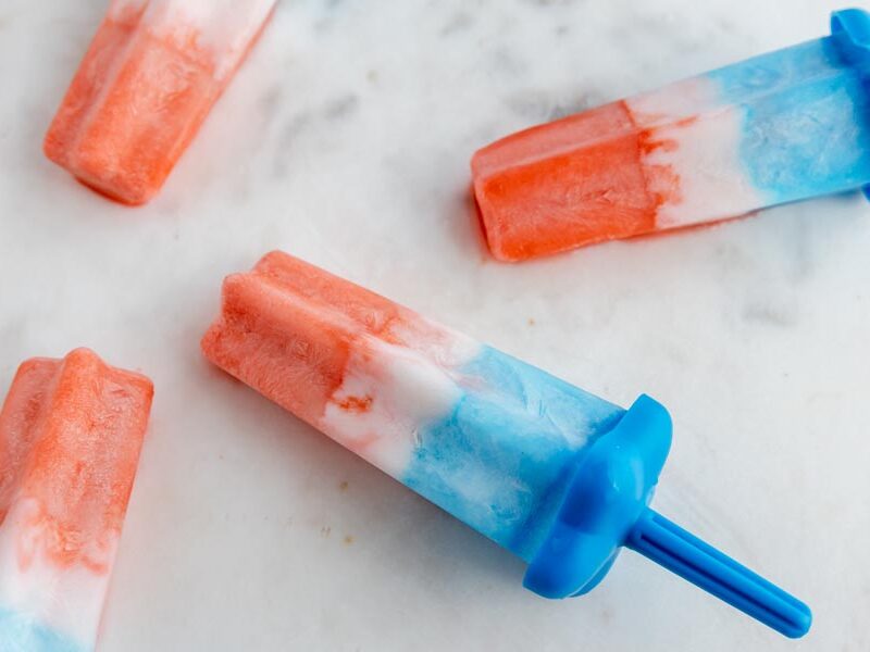 popsicles melting on a white counter