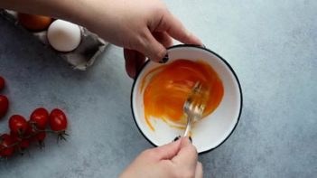 whisking eggs with a fork