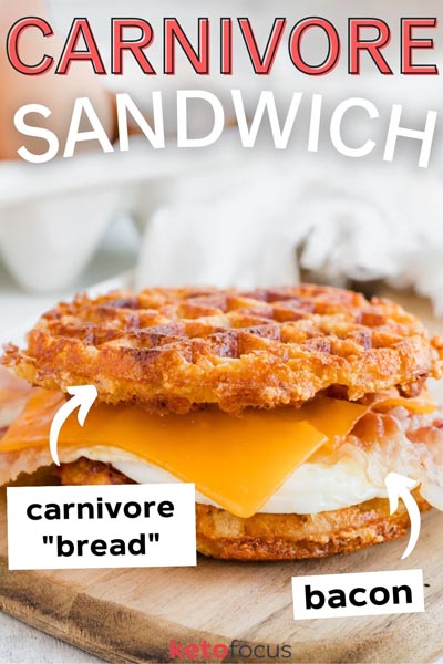 A waffle sandwich on a cutting board with melted cheese in the center of the sandwich.