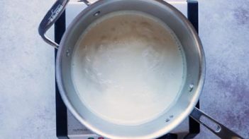 cream boiling in a saucepan