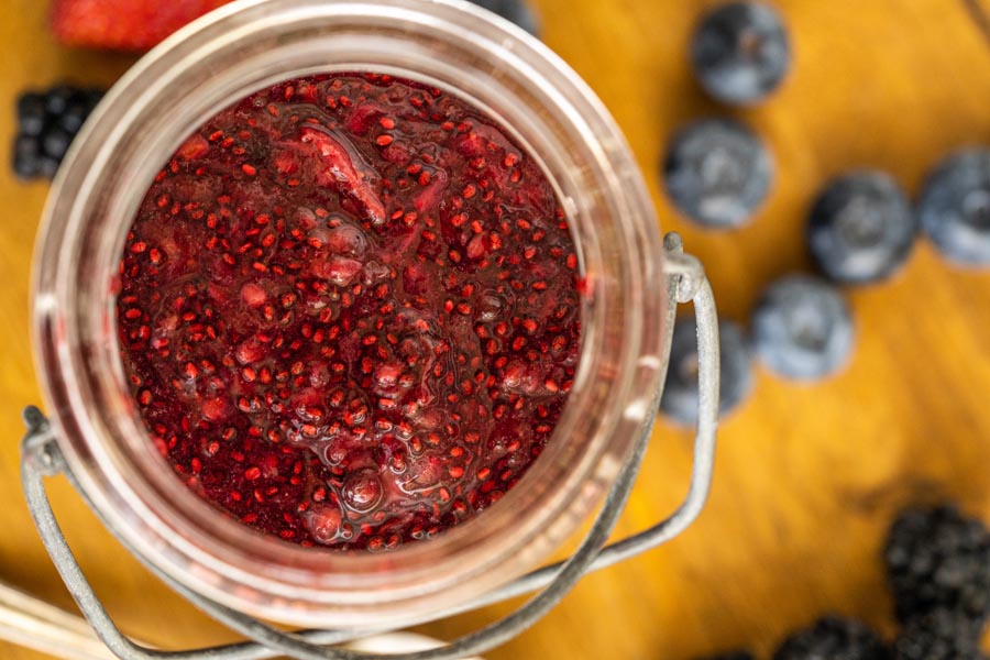 looking down onto a jar of berry seed jam