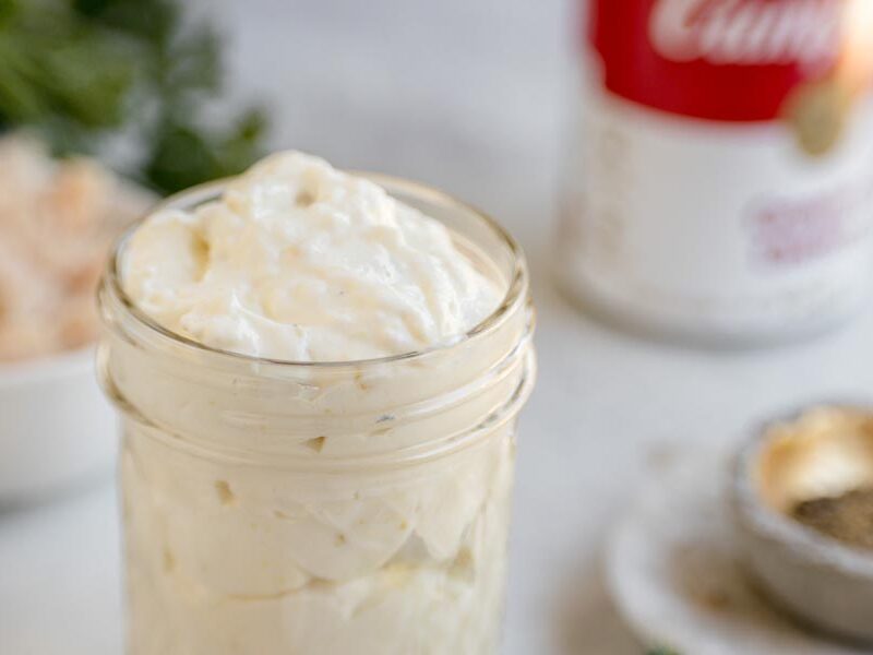Close-up of homemade cream of chicken soup showing its rich, thick, and creamy consistency.
