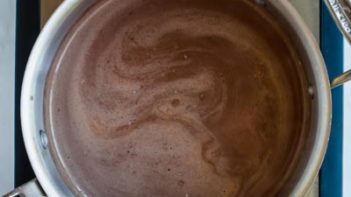low carb hot cocoa cooking in a saucepan