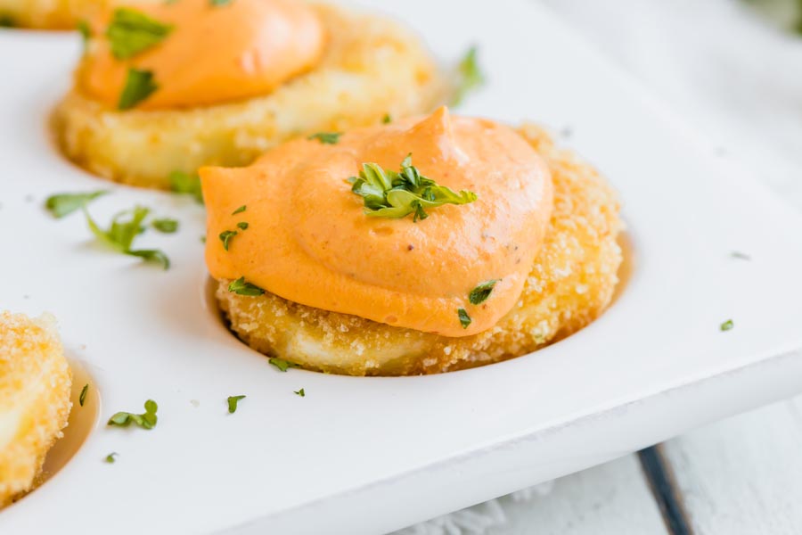 creamy smoky filling in a fried deviled egg