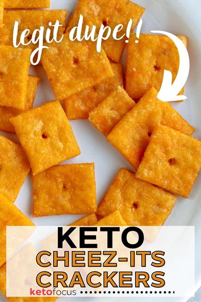 A pile of homemade baked cheddar crackers with text and arrow reading 'legit dupe'.