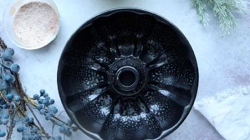 a bundt pan with cooking spray covering it