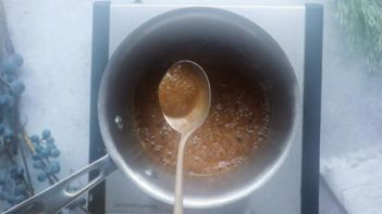 a spoonful of brown caramel syrup