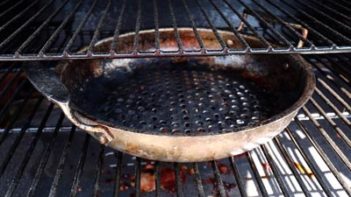heating a grill basket inside a traeger grill