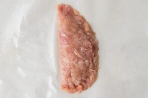Ground chicken folded over the cheese and pepperoni filling to form a half-moon shaped calzone.