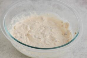 Chopped mushrooms, reserved mushroom liquid, and seasonings mixed into the creamy base for homemade cream of mushroom soup.