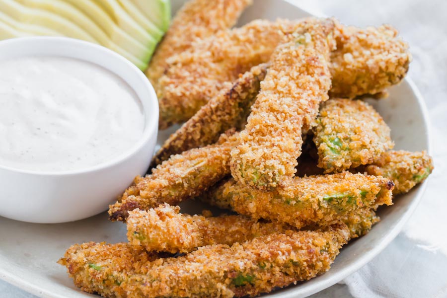 crispy keto avocado fries cooked in the air fryer on a plate