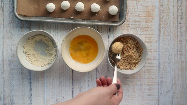 coating a cheese bite with pork panko