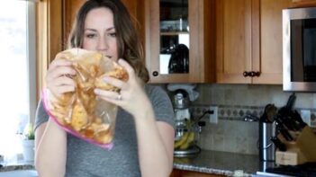 Annie from KetoFocus shaking a bag of chicken wings.