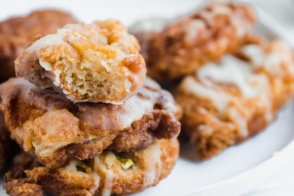 a stack of keto apple fritter donuts