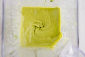 creamy green avocado mixture in a blender