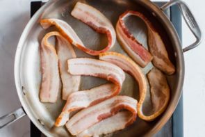 bacon cooking in a skillet