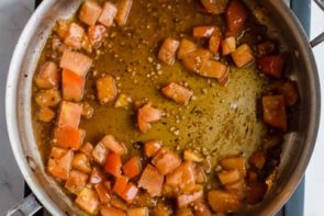 tomatoes cooking in a skillet