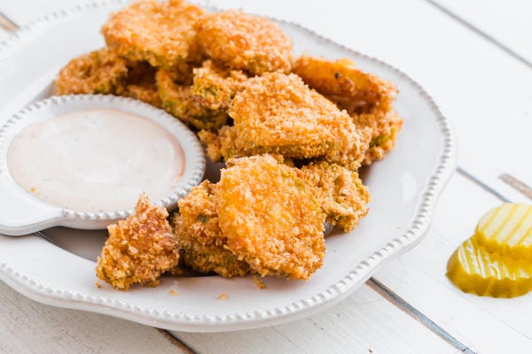 a bowl of fried pickles to serve at a potluck