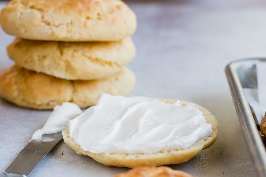 cream cheese spread on a half of a bagel