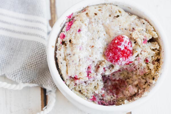 a bite out of a bowl of baked oats