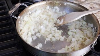 soften onions and garlic in a skillet