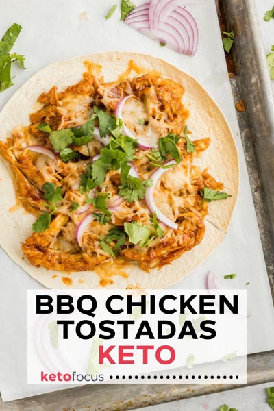 bbq chicken topped on a tortilla with green cilantro all over