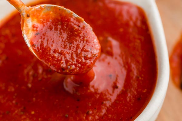 red bbq sauce with a spoon