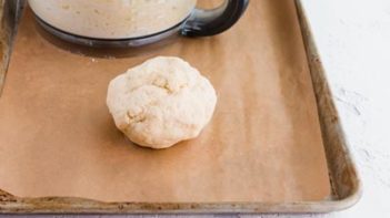 forming keto dough into a ball to make rolls