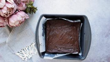 baked brownies in a square baking dish